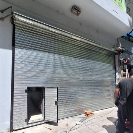 Reparación Puerta de Escape Cortinas